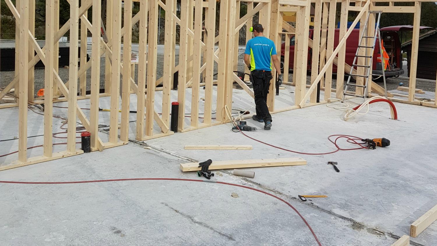 Timber wall framing going up on a concrete slab